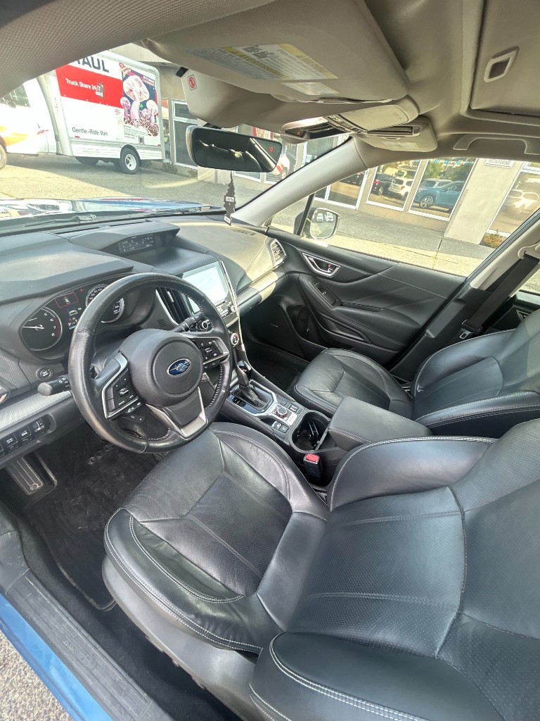 After — clean Subaru cabin and leather seats