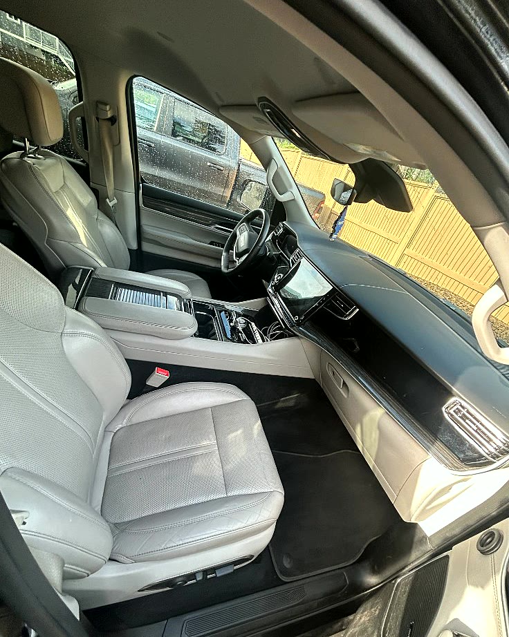Clean cream leather front cabin after an interior detail